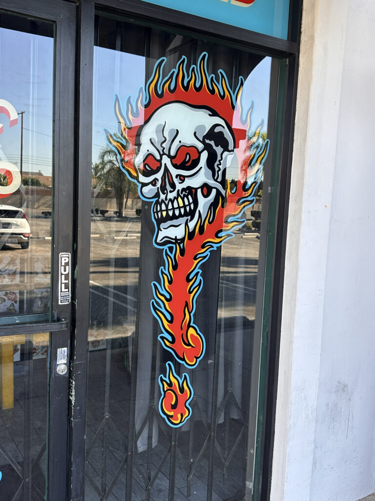 Clean Tattoo Studio Entrance Glass Clean tattoo studio entrance door and decorative storefront glass